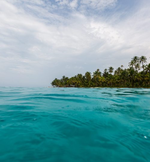 A beautiful scenery of the ocean under the cloudy sky in San Blas Islands, Panama